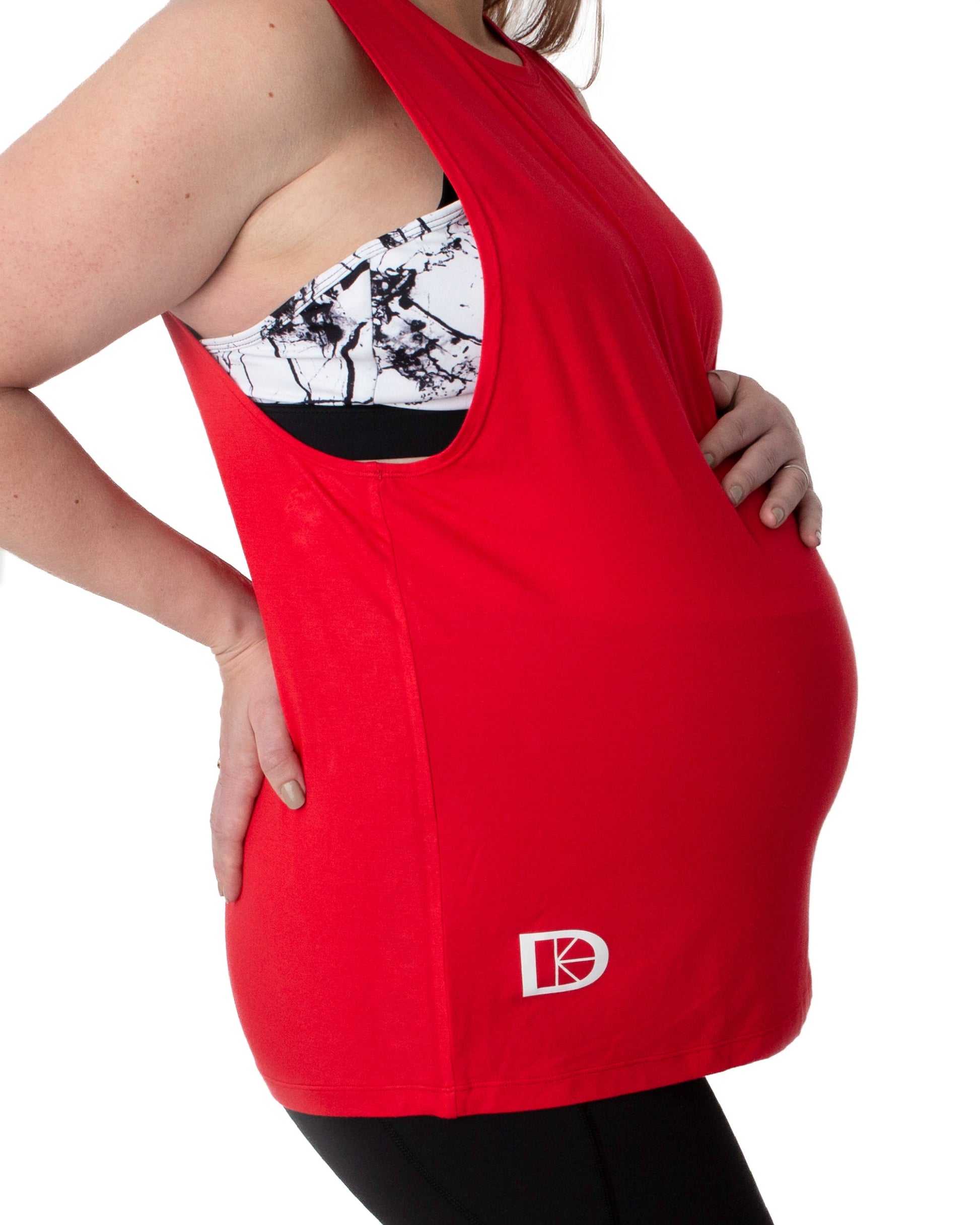 Red maternity vest over bump