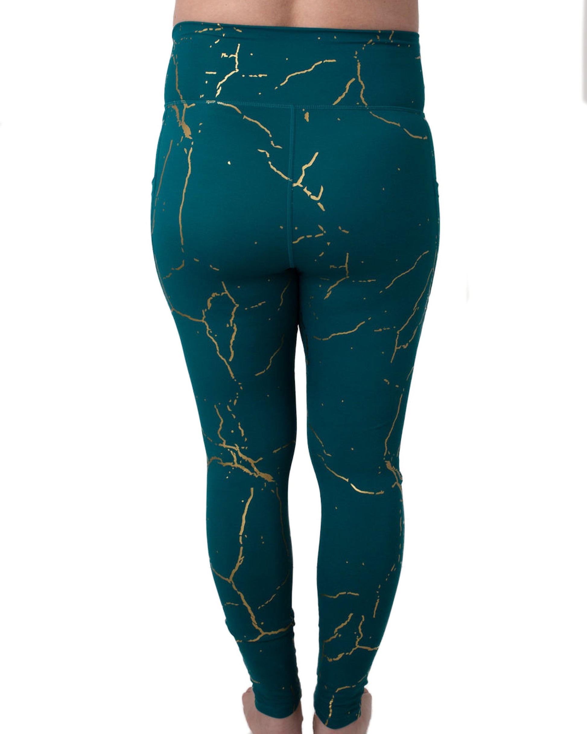 Back of maternity leggings in green and gold