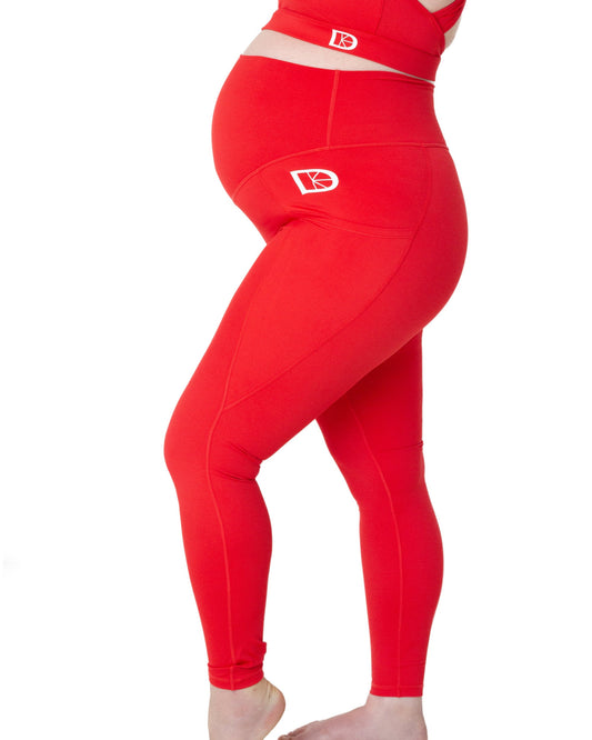 Maternity leggings in red side bump view